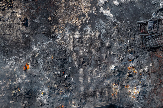Charred Ground and Collapsed Metal Structures After the Oraiokastro Wildfire