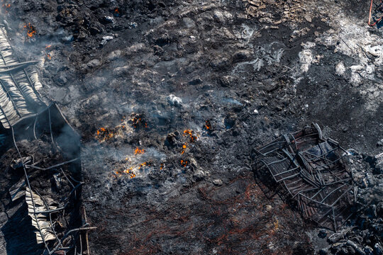 Charred Ground and Collapsed Metal Structures After the Oraiokastro Wildfire