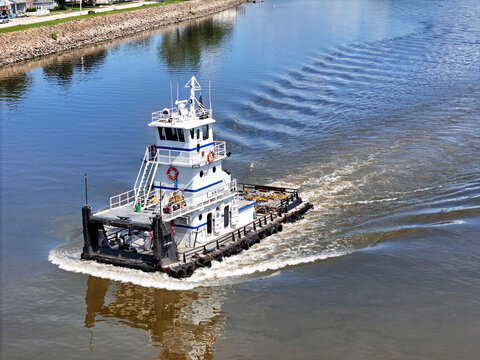 Sabula, Iowa June 22, 2026 Aerial view of the  River tugboat K.W. Duvall cruising South down the Mississippi river