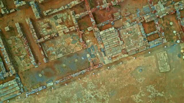 Aerial view of ancient stone ruins and archaeological site in Crete, Greece.