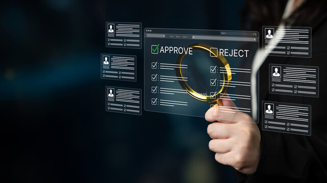 Businessperson Using Magnifying Glass to Evaluate Applications with Approve and Reject Options on a Transparent Digital Interface. Bitwise.