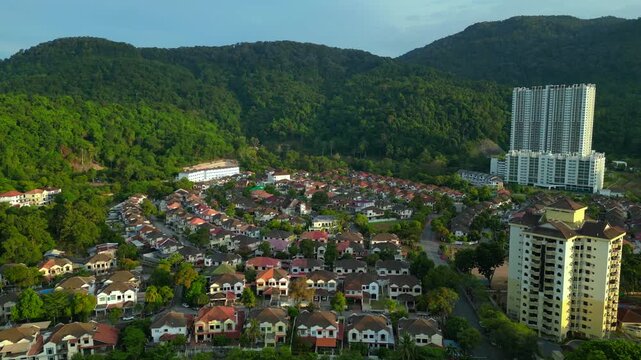 Row houses esidential area in Ferringhi hills. Lovely aerial view drone