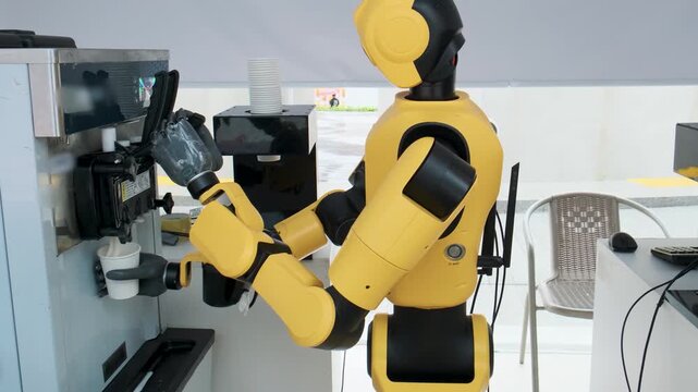 Humanoid robot dispenses soft serve ice cream into a cup in Shenzhen, China. Artificial intelligence, robotics, service automation, smart hospitality, future food preparation and service technology