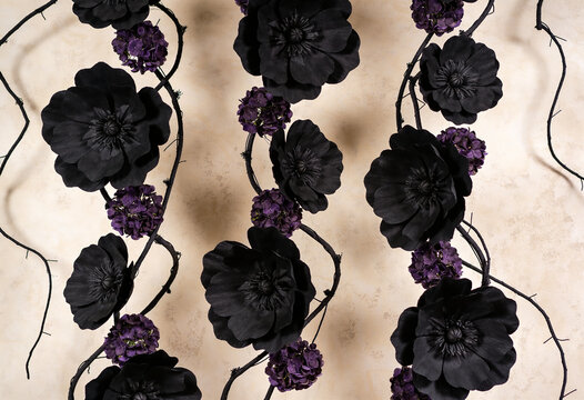 Black flowers, purple floral vine, gothic decoration, dark blooms, halloween decor, floral arrangement, dark poppy, moody flowers, gothic floral, branch decor, autumn floral, dark aesthetic.