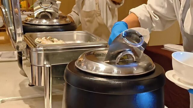 Restaurant server serving porridge soup into bowls, Buffet Banquet Setting, Fine Dining Event, Hotel Hospitality, Cafeteria Staff