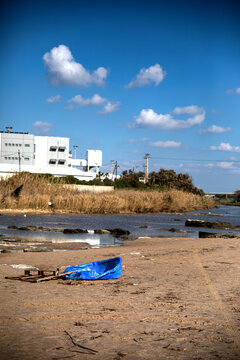 Picturesque Landscape of Ashdod Israel Showing the Lachish River Estuary Mediterranean Coast Rocky Beach Sandy Shore and Modern Waterfront on a Sunny Day