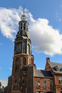 Munttoren Clock Tower and Historic Brick Buildings in Amsterdam