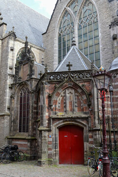 Oude Kerk Gothic Church Exterior with Bicycles in Amsterdam