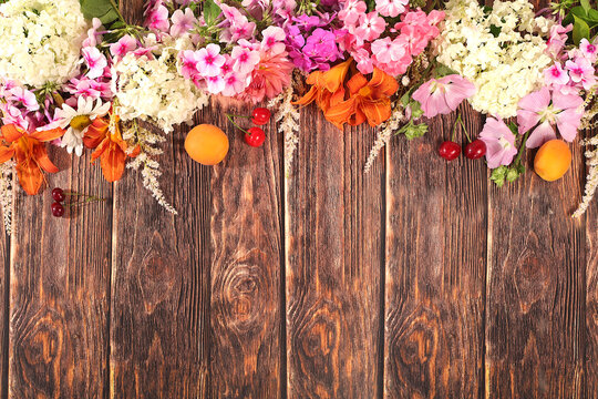 Abstract floral arrangement, background and festive floral concept for summer flyer,banner featuring beautiful garden flowers, daisies, hydrangeas, phlox, cherry blossoms and lilies, reminiscent