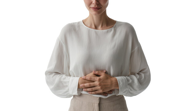 Isolated young woman holding her stomach, experiencing abdominal pain or digestive discomfort