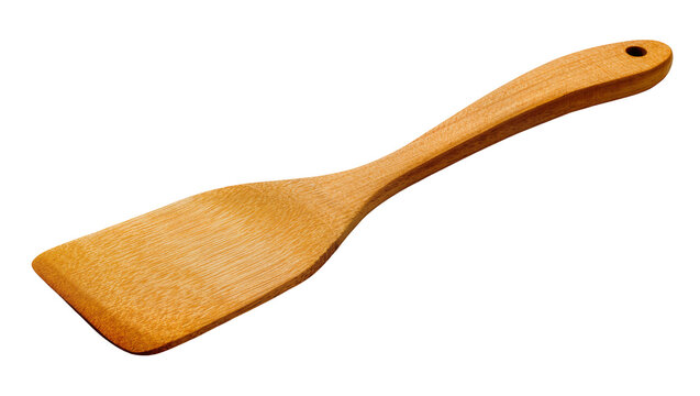Isolated natural wood cooking spatula, essential kitchen utensil for food preparation