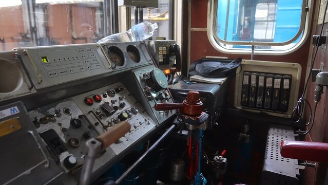 A detailed view of the control panel and equipment inside a vintage train cabin. Concept of transportation, engineering, and history for editorial use and educational projects.