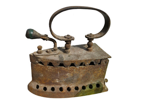 Antique rusted iron charcoal pressing iron isolated on white background