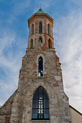Fototapeta premium Medieval stone tower of the Mary Magdalene Church rising against the sky above Budapest's Castle Hill, Hungary