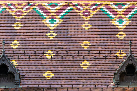 Close view of geometric diamond tile pattern on the roof of the Hungarian National Archives in Budapest, Hungary