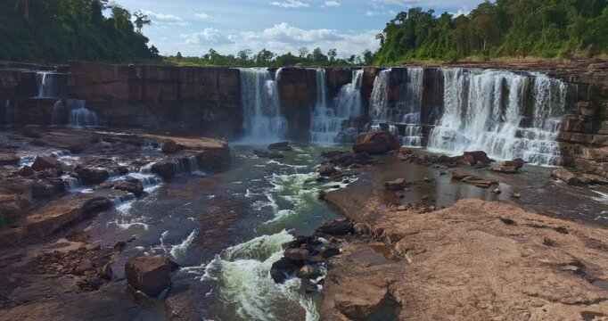 Aerial view of Sae Pong Lai Waterfall is a hidden gem, offering a pristine environment ideal for travel, exploration, and nature appreciation.Exploring the Pristine Tropical Landscape