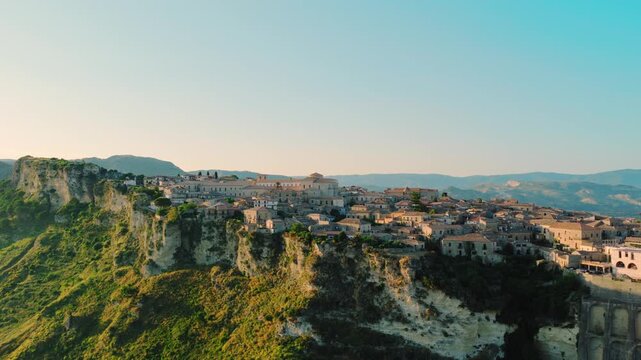 Leaving the village of Gerace in Calabria at sunset, mountain landscape
