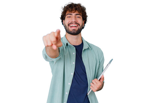 Happy young man pointing finger forward and choosing, smiling with confidence while holding a digital tablet