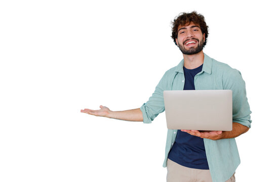 Young smiling man presenting solution with laptop, showing blank space, offering advertisement opportunity, positive concept