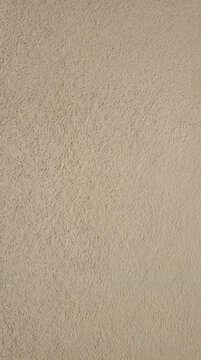 Beige stucco plaster texture background full frame wall render abstract surface for design