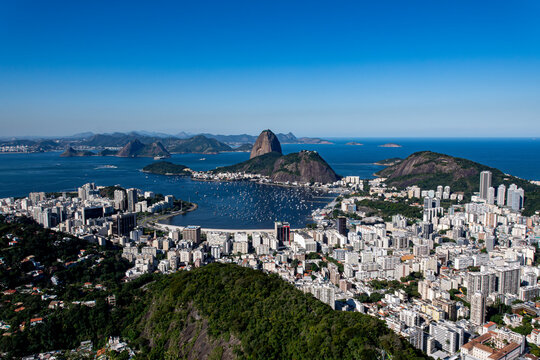 The view from the Dona Marta Lookout reveals Rio de Janeiro, featuring Guanabara Bay, Sugarloaf Mountain, and the city itself. Brazil.