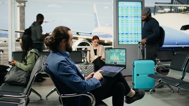CEO evaluates company data and KPIs on a laptop at the airport, comparing financial performance before departure on a business trip.
