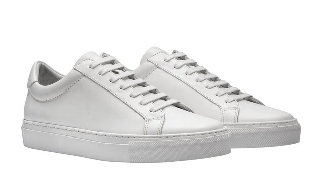 Isolated pair of clean white leather minimalist sneakers for casual fashion and comfort