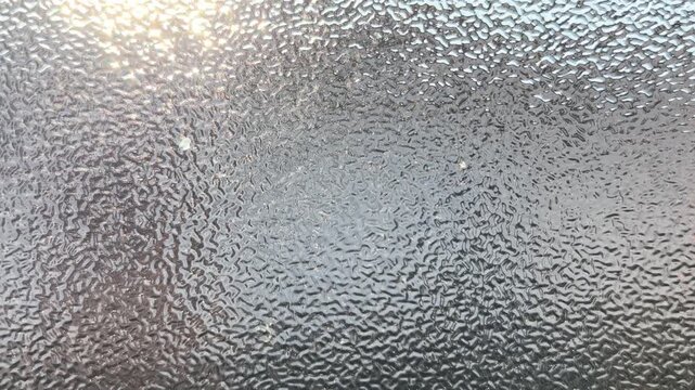 Frosted Glass Window Texture Background with Abstract Pattern. Seamless Stippled Frosted Glass Window Background