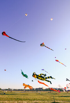 Berlin, Germany - September 27, 2025: Giant kites fill the sky above Tempelhofer Feld during the annual Festival der Riesendrachen, one of Berlin's most popular outdoor autumn events