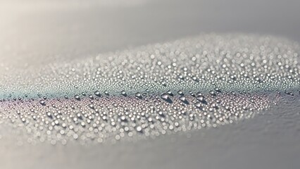 Obraz premium Macro water droplets on grey metallic surface, condensation beads with iridescent rainbow reflection, moisture texture on waterproof car paint for automotive care concept