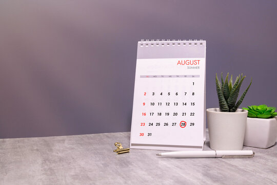 August 28 Calendar Date with Copy Space and Office Desk Accessories