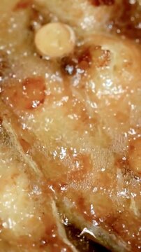Fresh Fish Steak Frying in Hot Boiling Oil