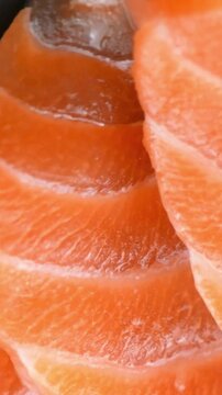 Close-up view of fresh raw salmon fish fillet slice
