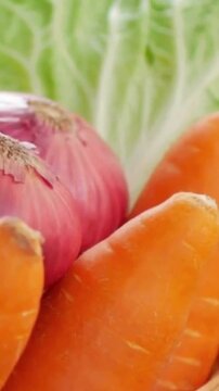 Fresh Raw Vegetables Including Red Onions and Carrots