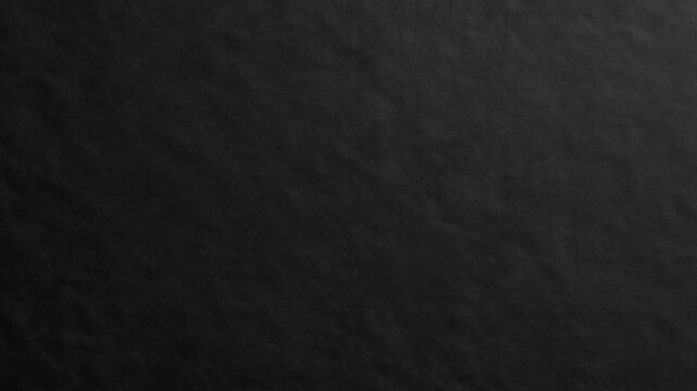 A high-quality dark black surface with subtle organic textures and faint scratches. This elegant, moody material provides a minimalist aesthetic for professional design projects.