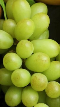 Fresh Green Grapes and Citrus Fruits Close Up