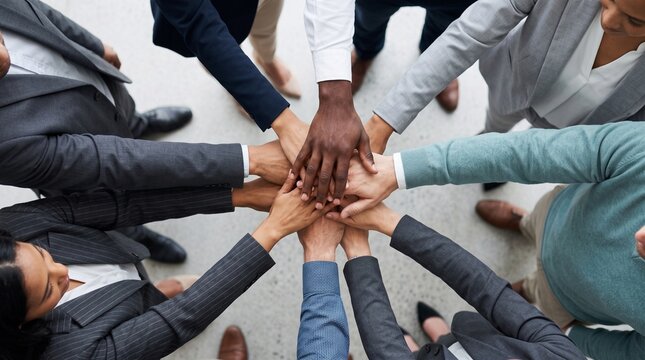 Diverse Business Team Standing in Unity with Hands Stacked Together