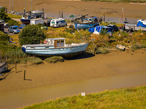 Boats at Low Tide Aerial View in Sussex Estuary and Riverside Boatyard