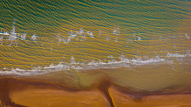 Low Tide Sand Patterns Aerial View of Coastal Beach Texture and Tidal Flow