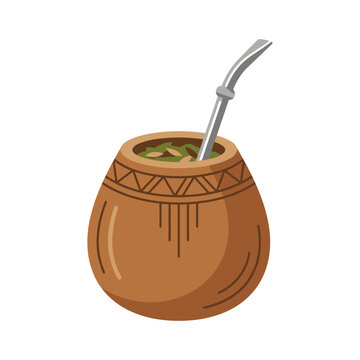 Traditional South American mate tea in a wooden gourd with a metal straw