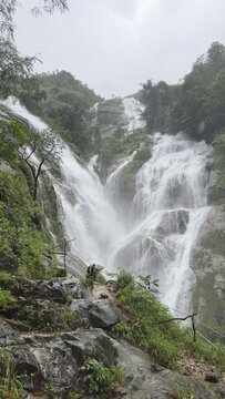 Pretu Kro Waterfall in Tak Thailand Surrounded by Lush Tropical Rainforest