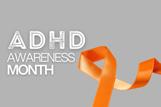 Bright orange ribbon signifies ADHD awareness and support efforts