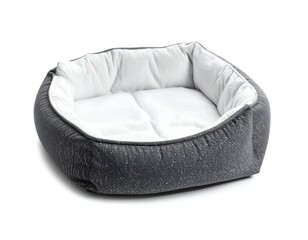 Obraz premium Comfortable grey and white pet bed for dogs or cats, studio isolated shot