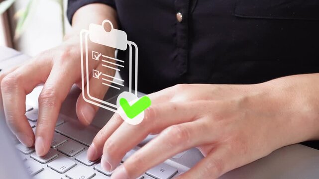 Close-up view of an executive typing on her laptop with an animated clipboard icon and checkmark.