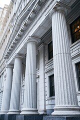 Obraz premium Grand Marble Columns of Neoclassical Architecture Gracing a Historic Building Facade
