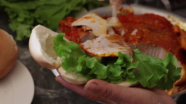 Making a Peruvian ham sandwich with traditional ingredients