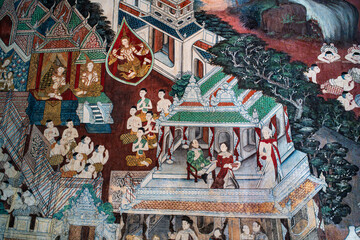 Detailed traditional Thai temple mural depicting people, architecture and a ceremonial scene, reflecting Buddhist art and Thailand’s cultural heritage. © pachara