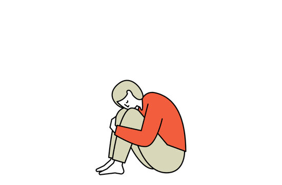 膝を抱える人