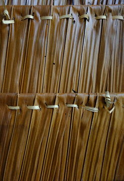 Traditional dried palm leaf thatch roofing texture