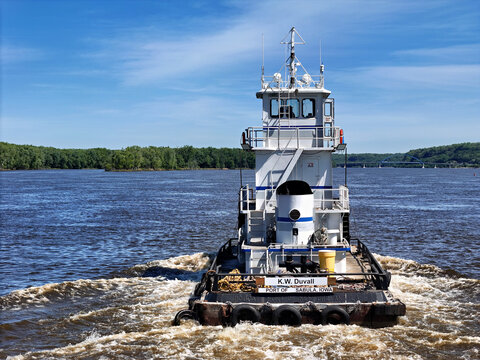 Sabula, Iowa May 14, 2026 Rear view of the  River tugboat K.W. Duvall cruising North up the Mississippi river